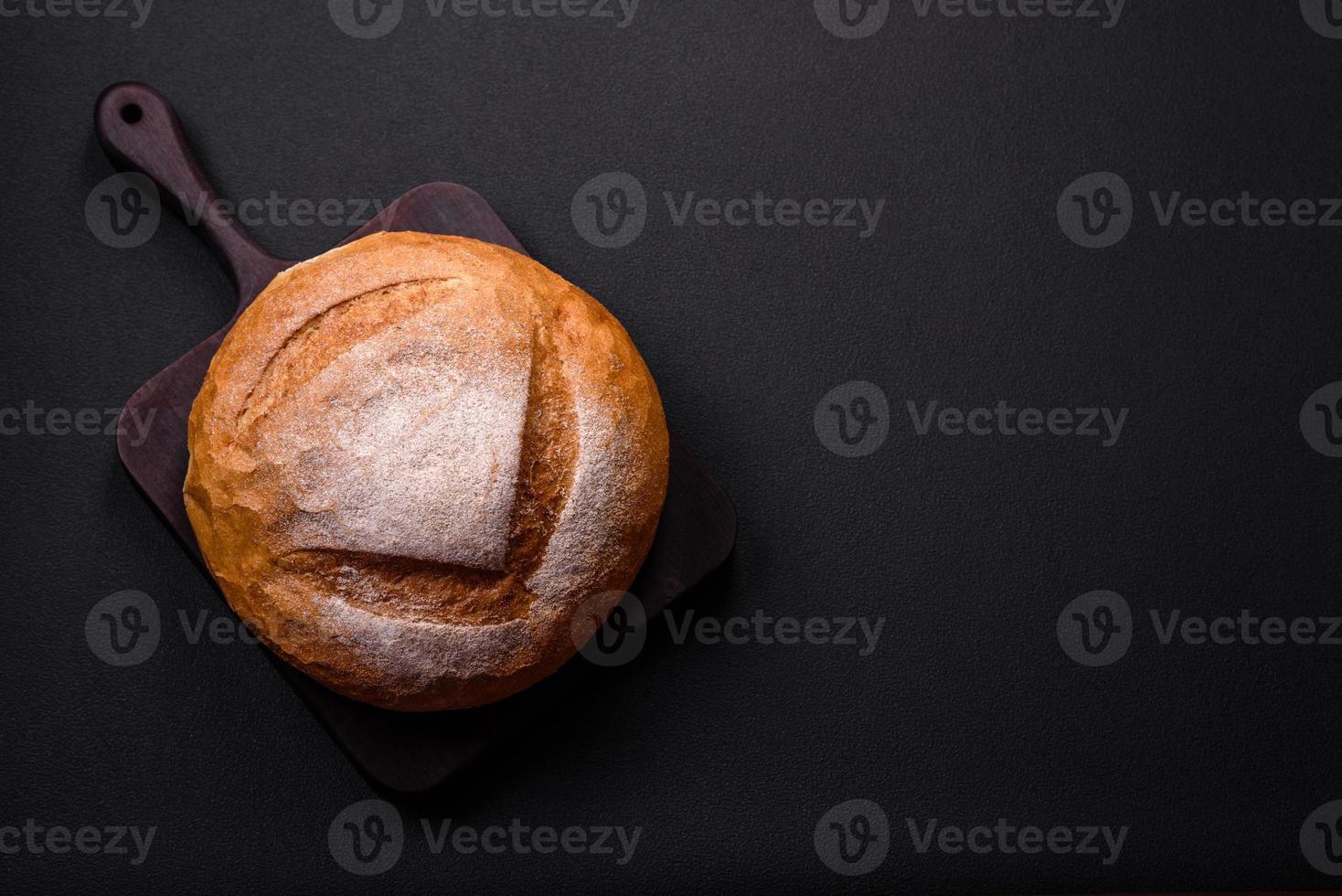 Beautiful delicious freshly baked round shaped white bread photo