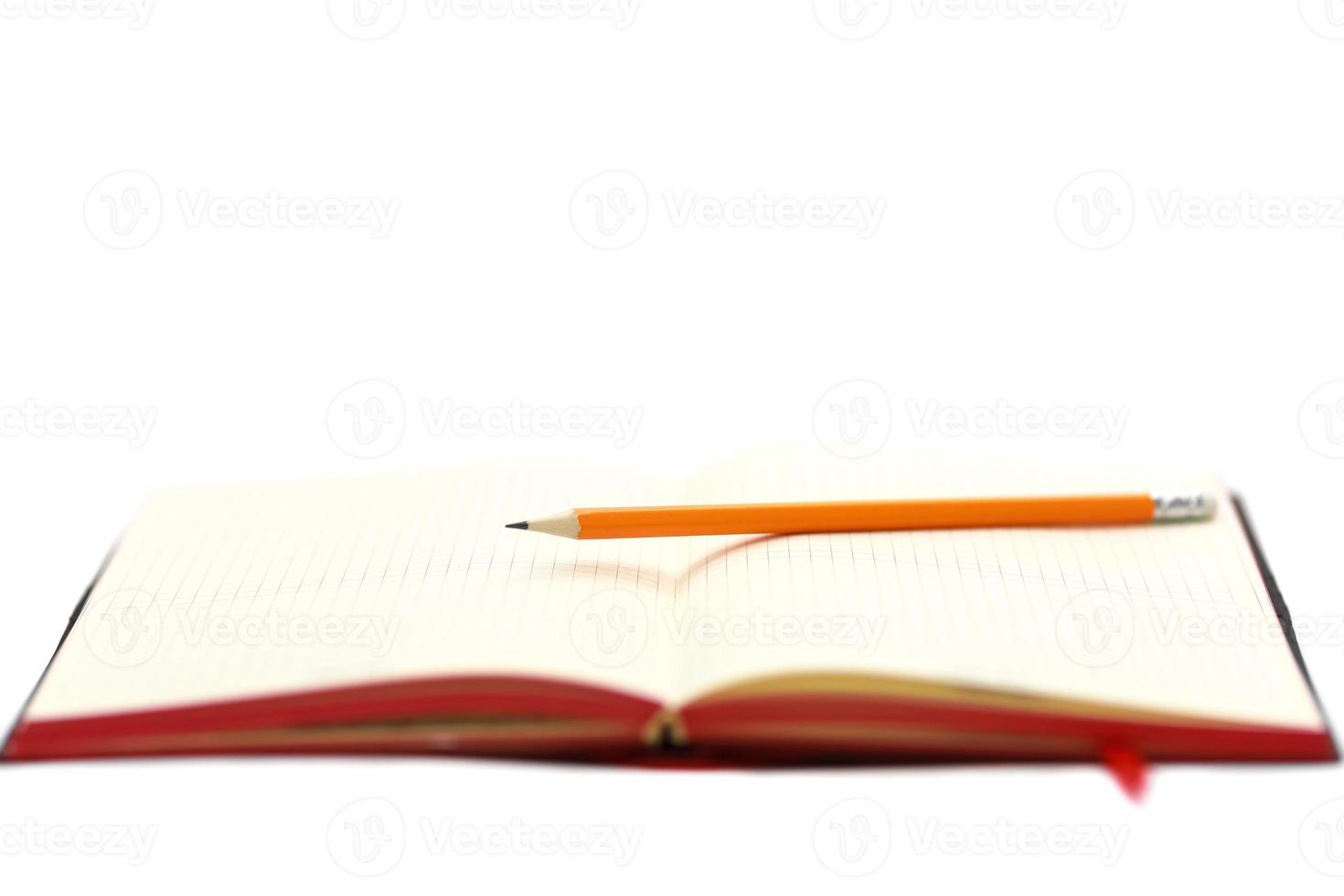 Business concept. Top view collection of notebook, white open flip curl rolled page and pencil on background for mockup photo