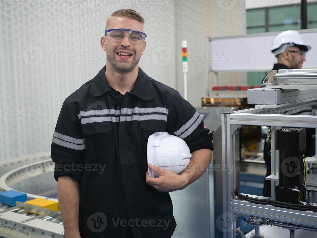 Staff employee labor manager supervisor company stand look at camera white hardhat helmet safety wear uniform glasses happy smile service work job occupation engineer technician industry architect photo