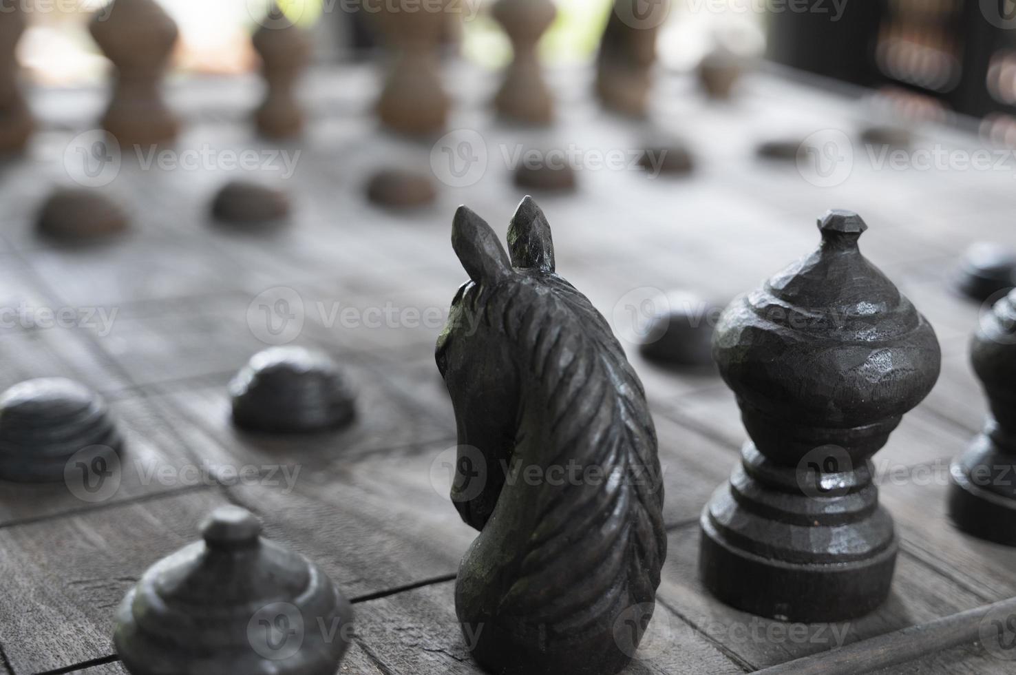 Ancient wooden chess pieces on an old chessboard Stock Photo - Alamy