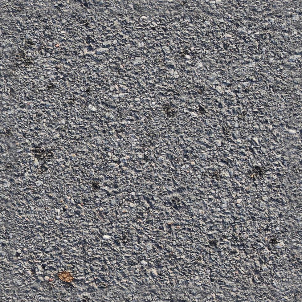 textura fluida detallada de asfalto en una calle en alta resolución foto