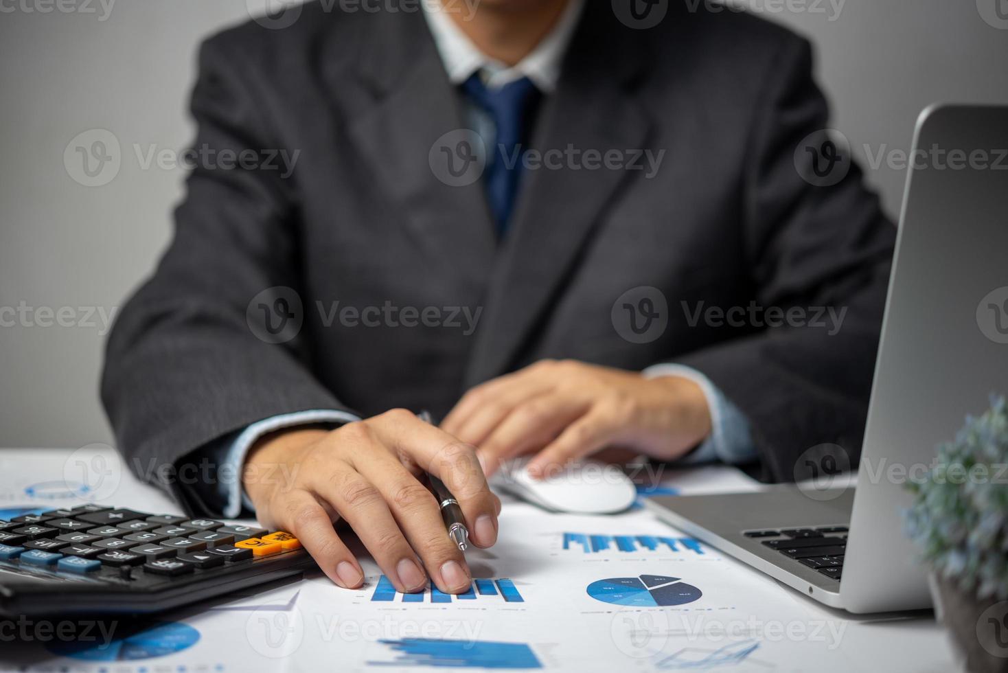 Businessperson document charts and graphs report statistic marketing and accounting showing the results of their successful. photo