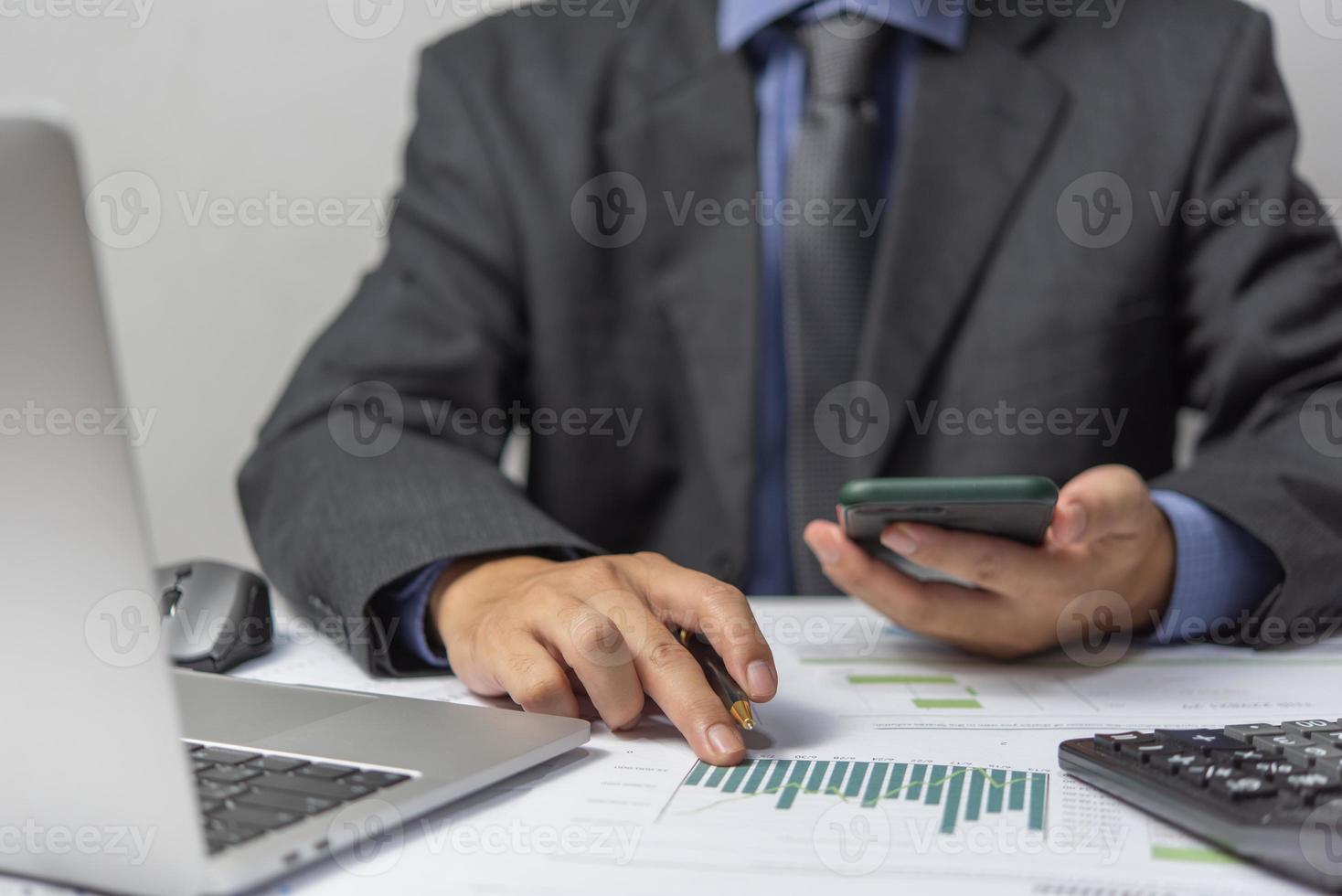 Businessperson document charts and graphs report statistic marketing and accounting showing the results of their successful. photo