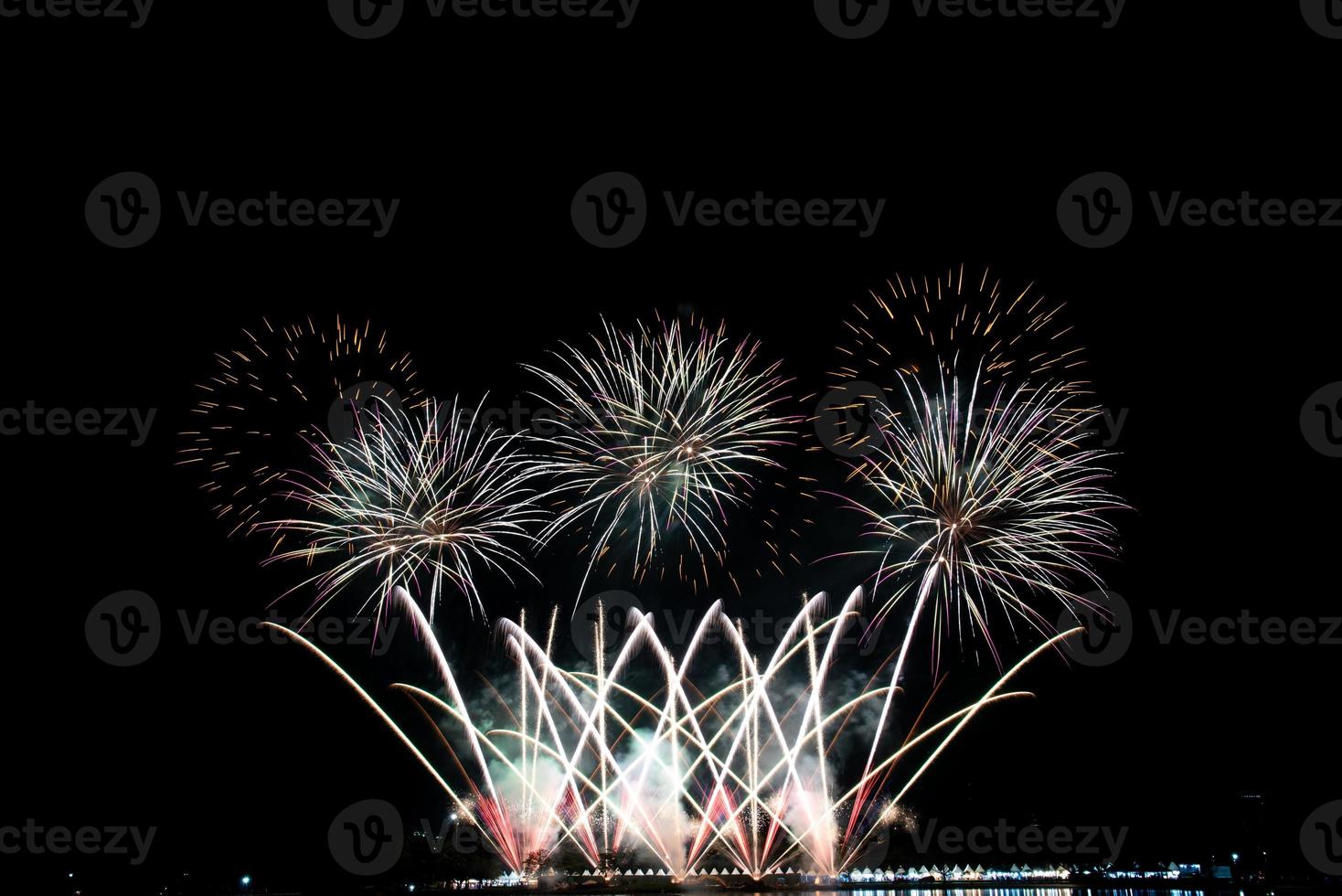 Abstract colored firework new year festival night sky background. photo