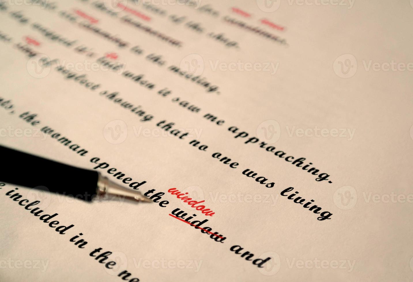 spelling check paperwork with red mark photo