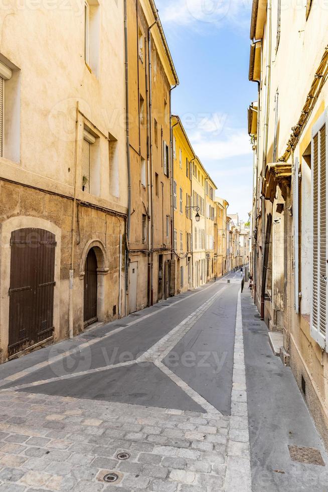 View of streets. Cozy idyllic street with doors and colorful walls. Traditional south, Mediterranean buildings and narrow streets photo