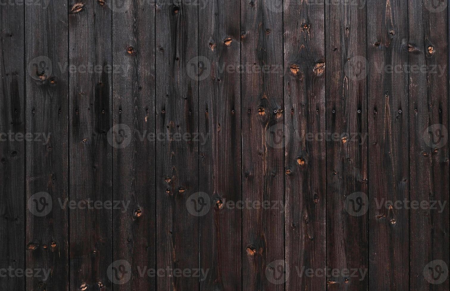 Natural Dark Wooden Background. Wooden rustic background. Old boards. Copy space for your text or image. Top view. Dark brown wood boards. Blank for design and require a wood grain. photo