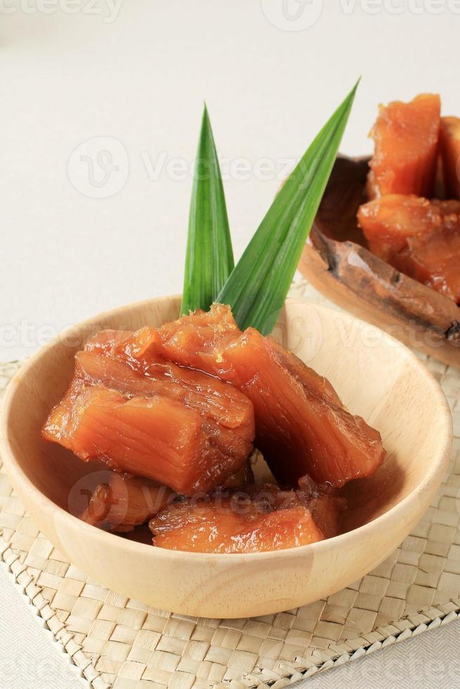 Sweet Cassava in Palm Sugar Syrup, Thai Dessert photo