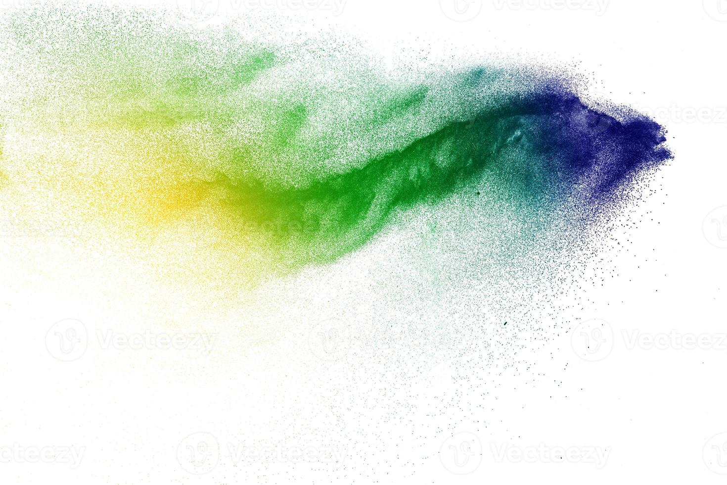Abstract colorful dust particles textured background.Multicolored particles explosion on white background. photo