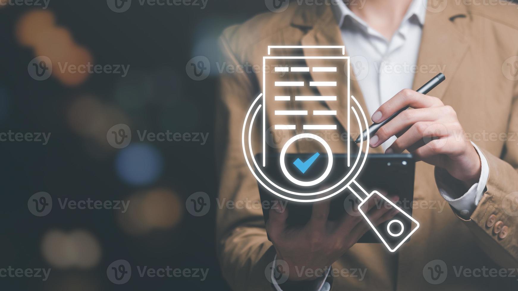 Businessman Audit documents, quality assessment management With a checklist, business document evaluation process, market data report analysis and consulting, plan review process photo