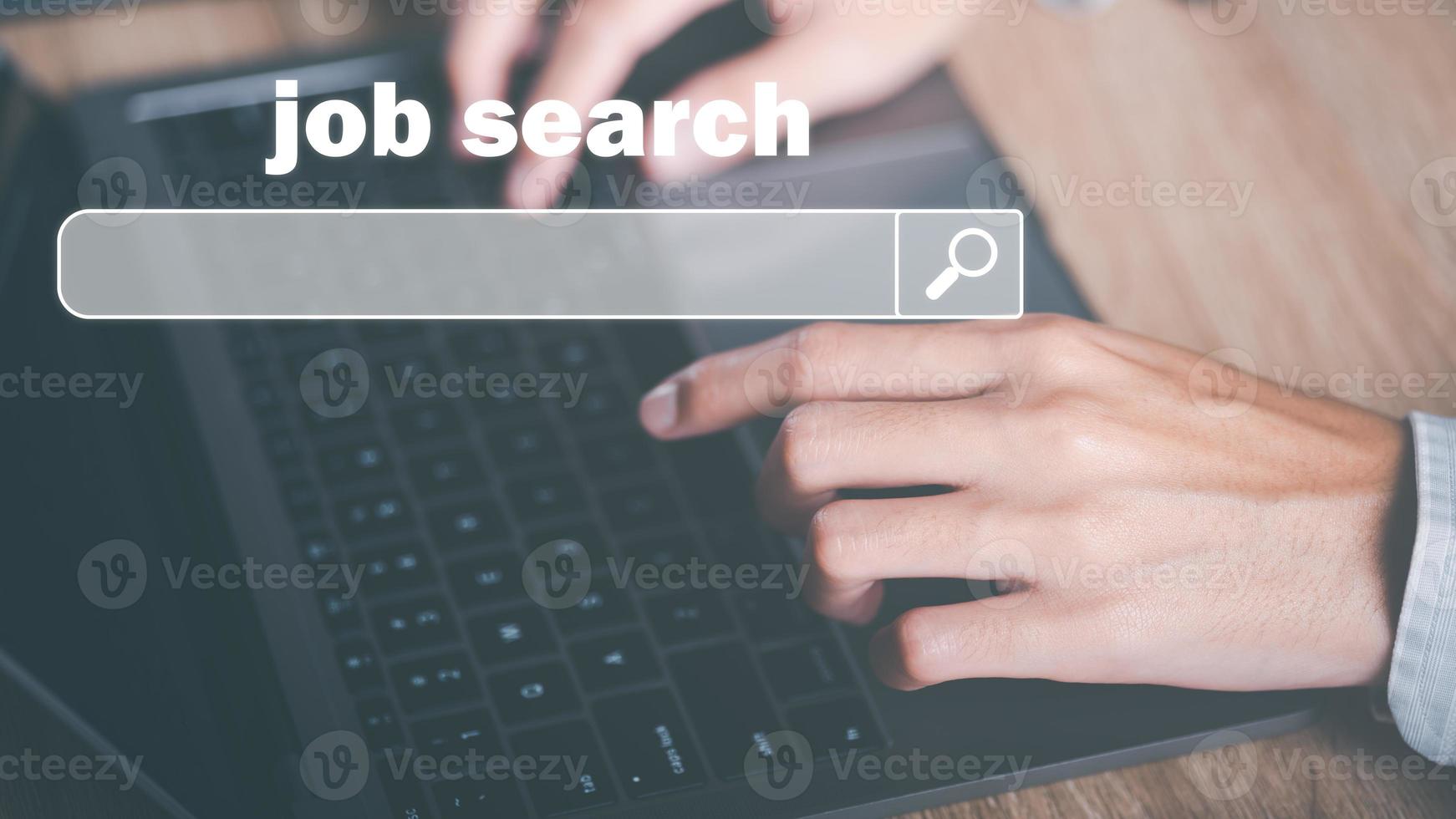 Man using laptop showing online job search, career search ideas, recruitment, HR search, form websites and job applications,employment management of agencies with Internet technology photo