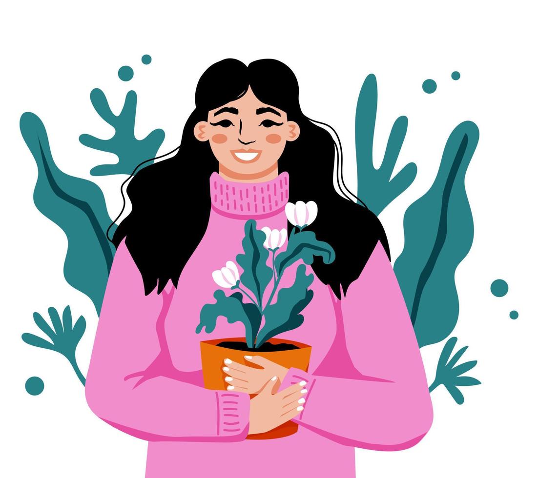 Woman holding blooming houseplant in pot. Girl in cozy sweater is proud