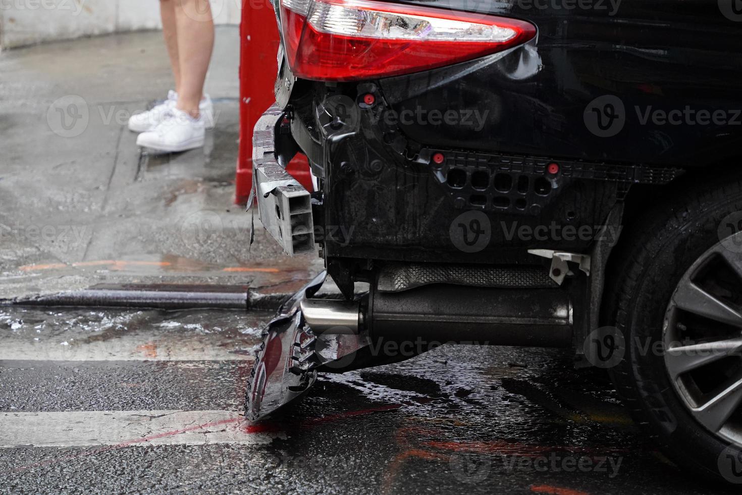 crashed car heavy rain in chinatown new york city photo