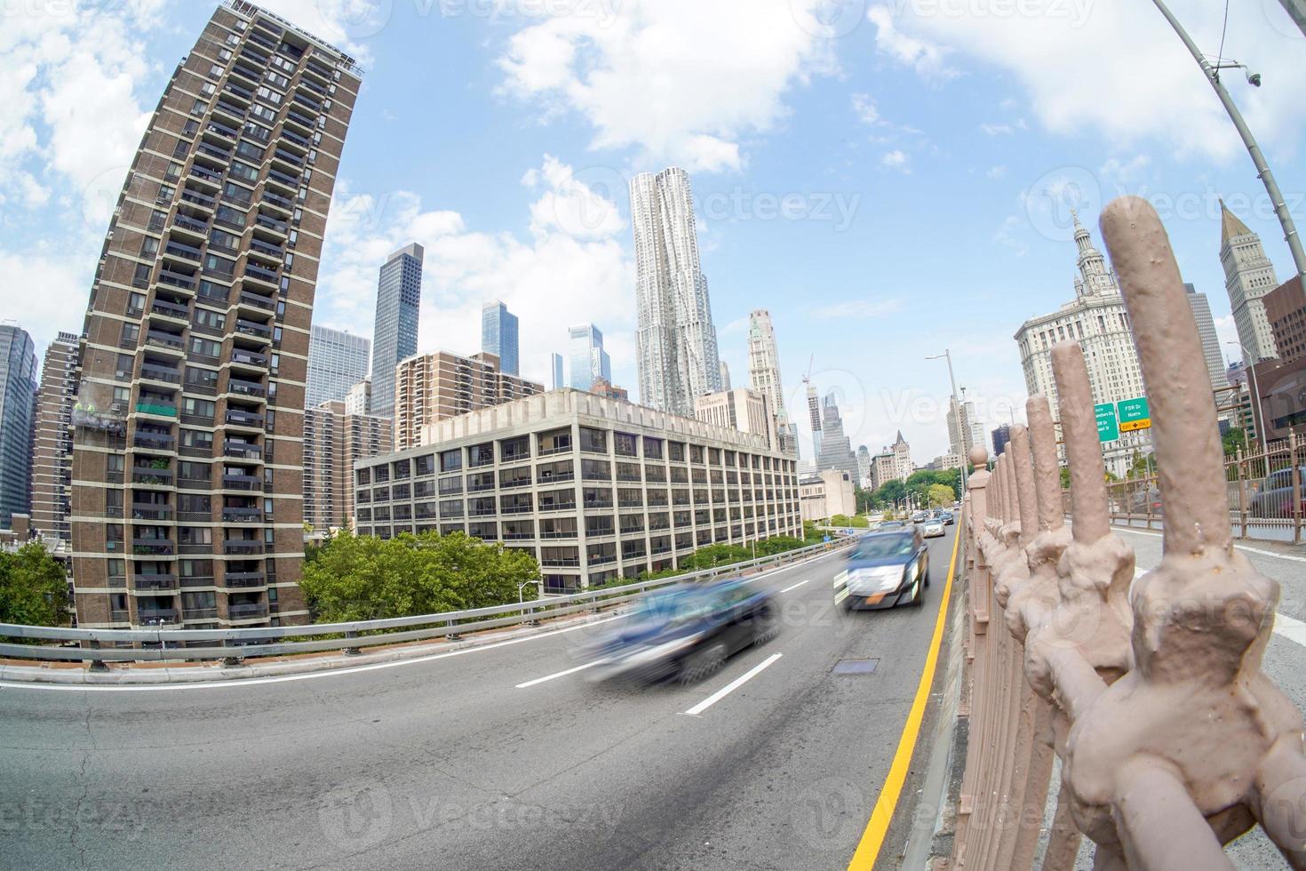 brooklyn bridge moving traffic new yok photo