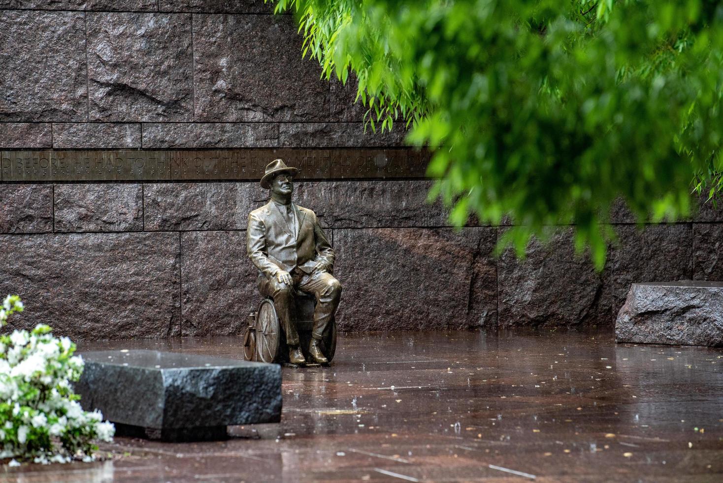 WASHINGTON DC, USA - MAY 17 2018 - Roosevelt memorial statue under the rain in DC photo