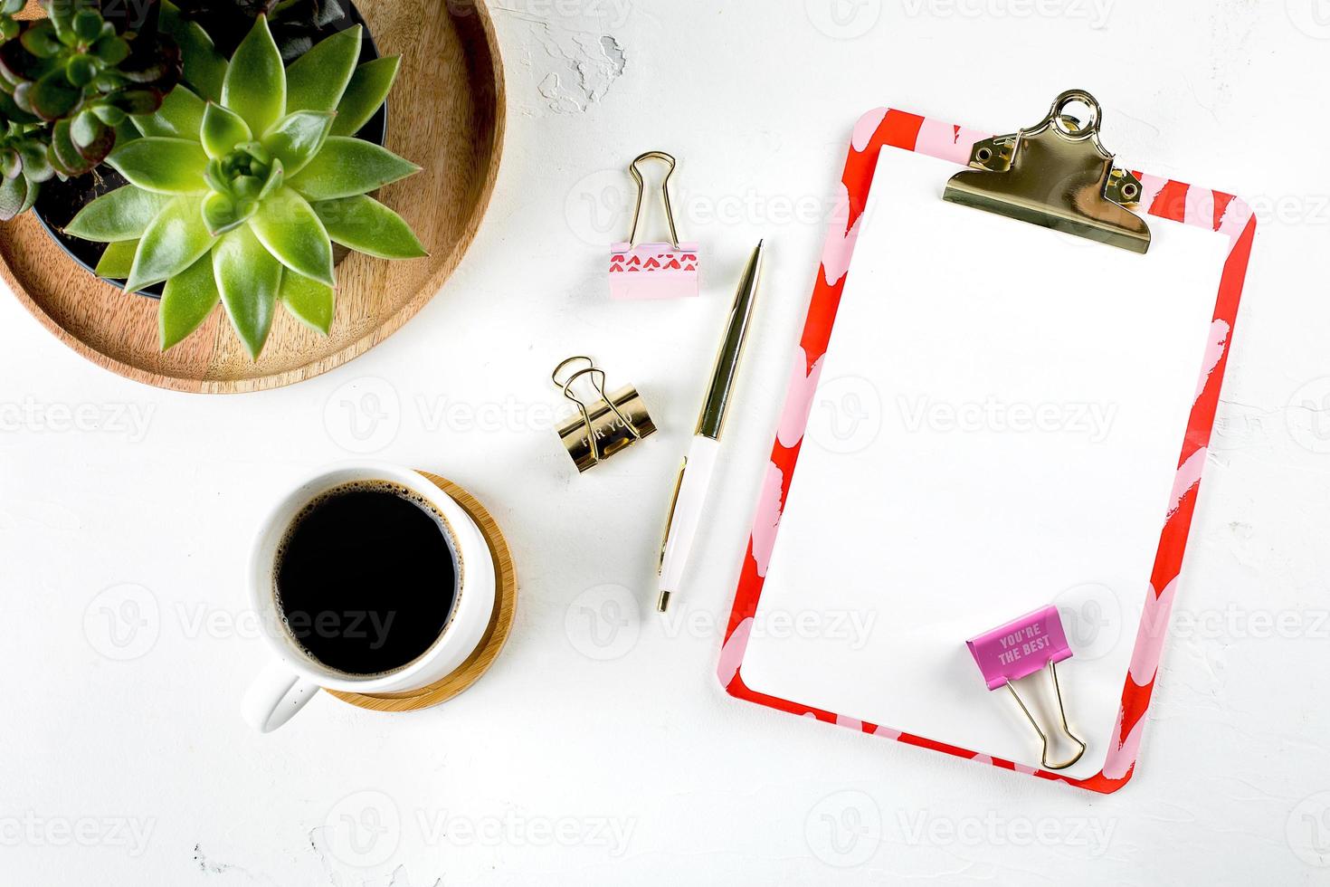 Flat lay feminine home office photo