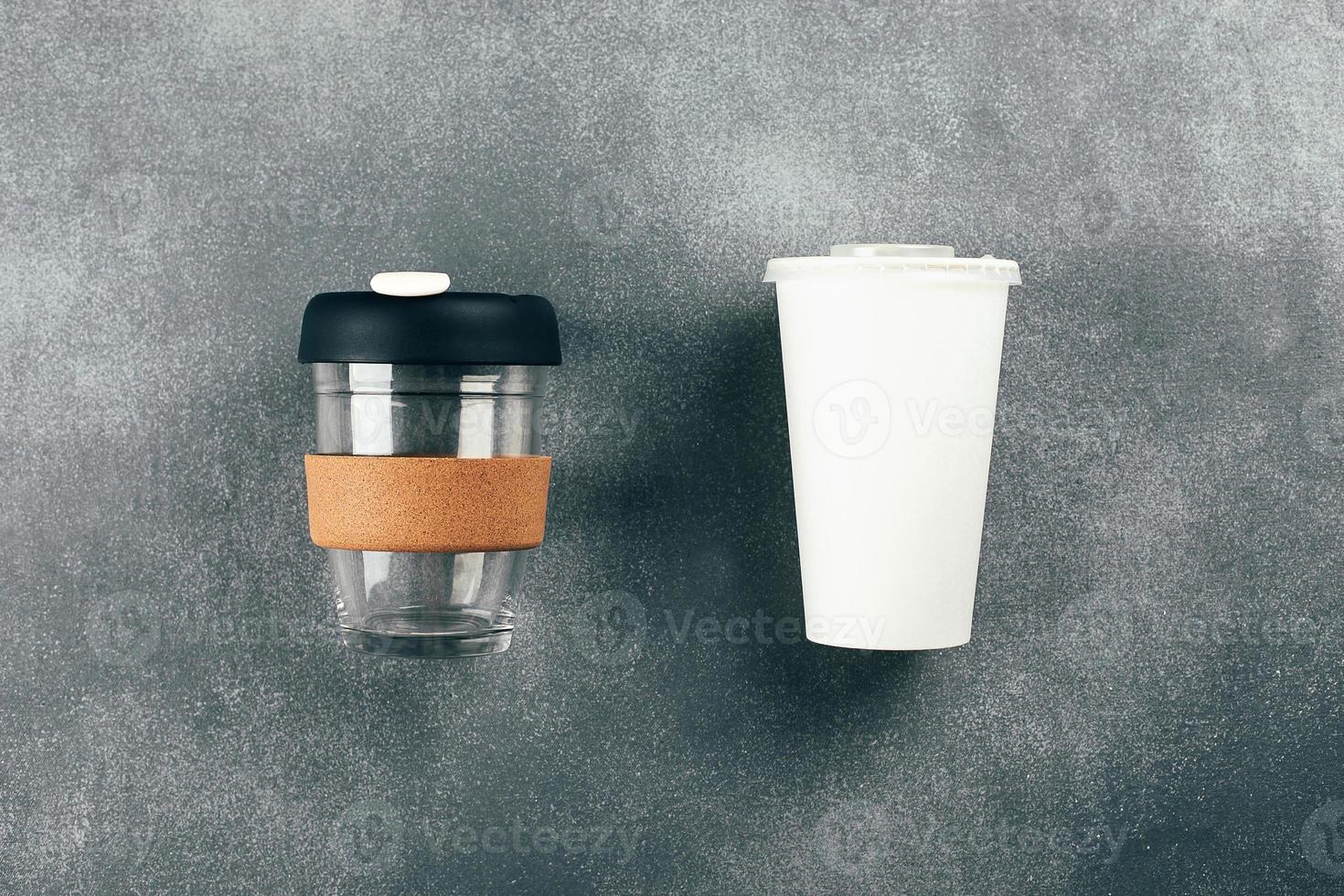 Takeaway coffee cup and disposable paper cup with plastic lid. Conscious choice. Zero waste concept photo