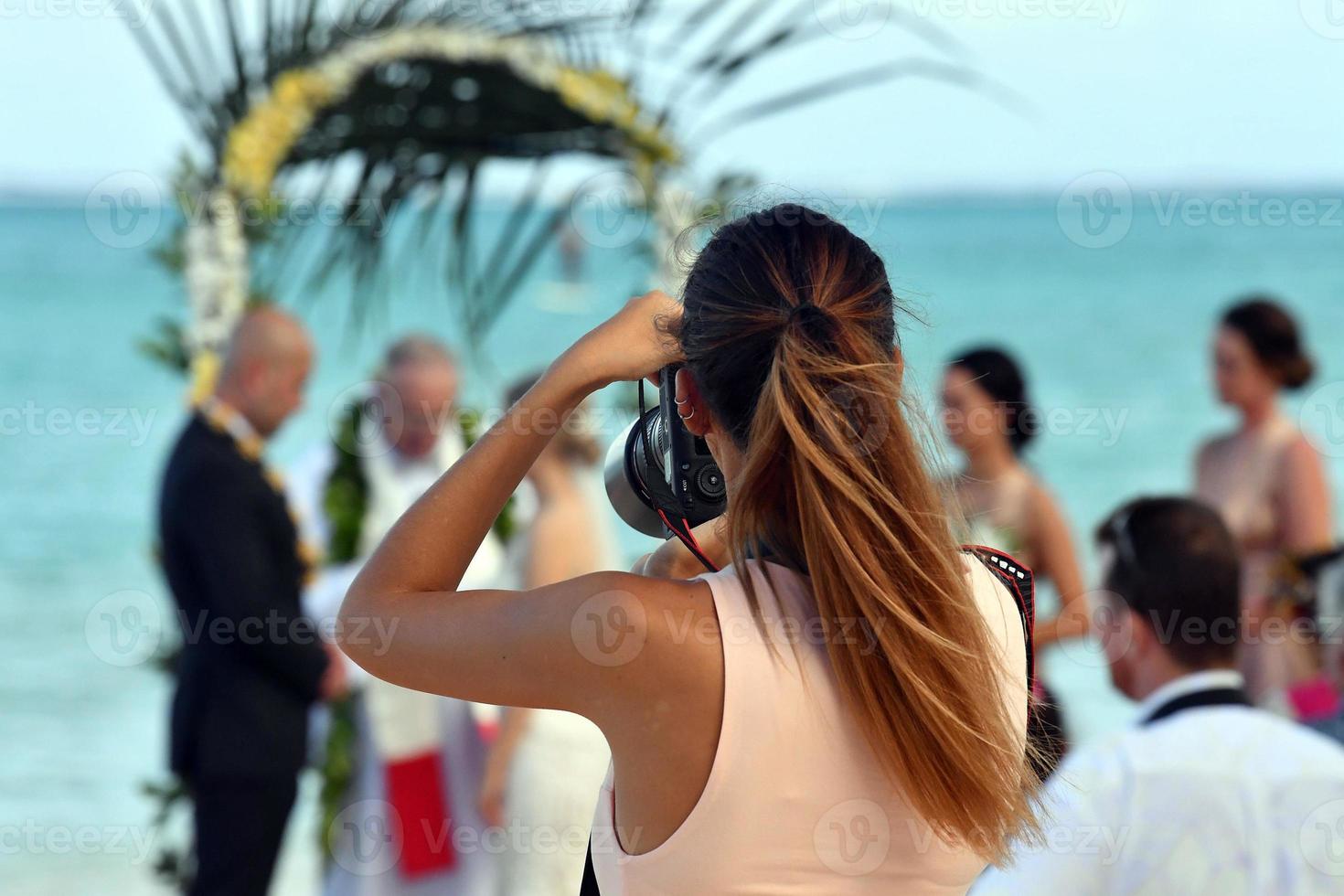 RAROTONGA, COOK ISLANDS - AUGUST 19, 2017 - Wedding on tropical paradise sandy beach photo