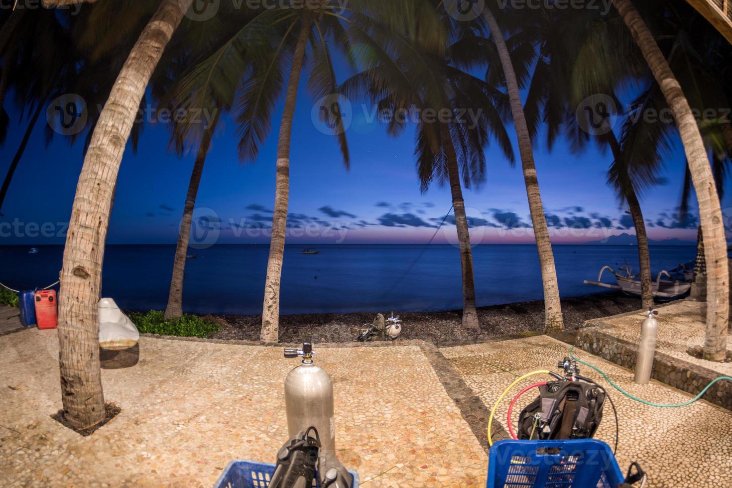 sunrise on the beach before diving indonesia photo