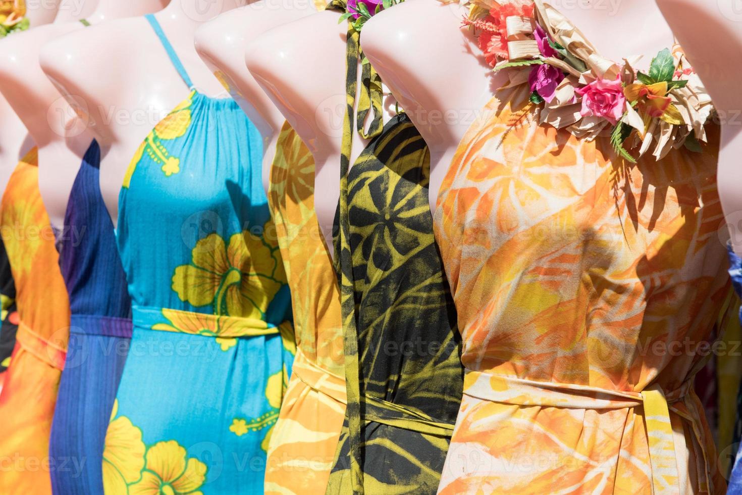 colorful pareo and polynesian dress for sale at market photo