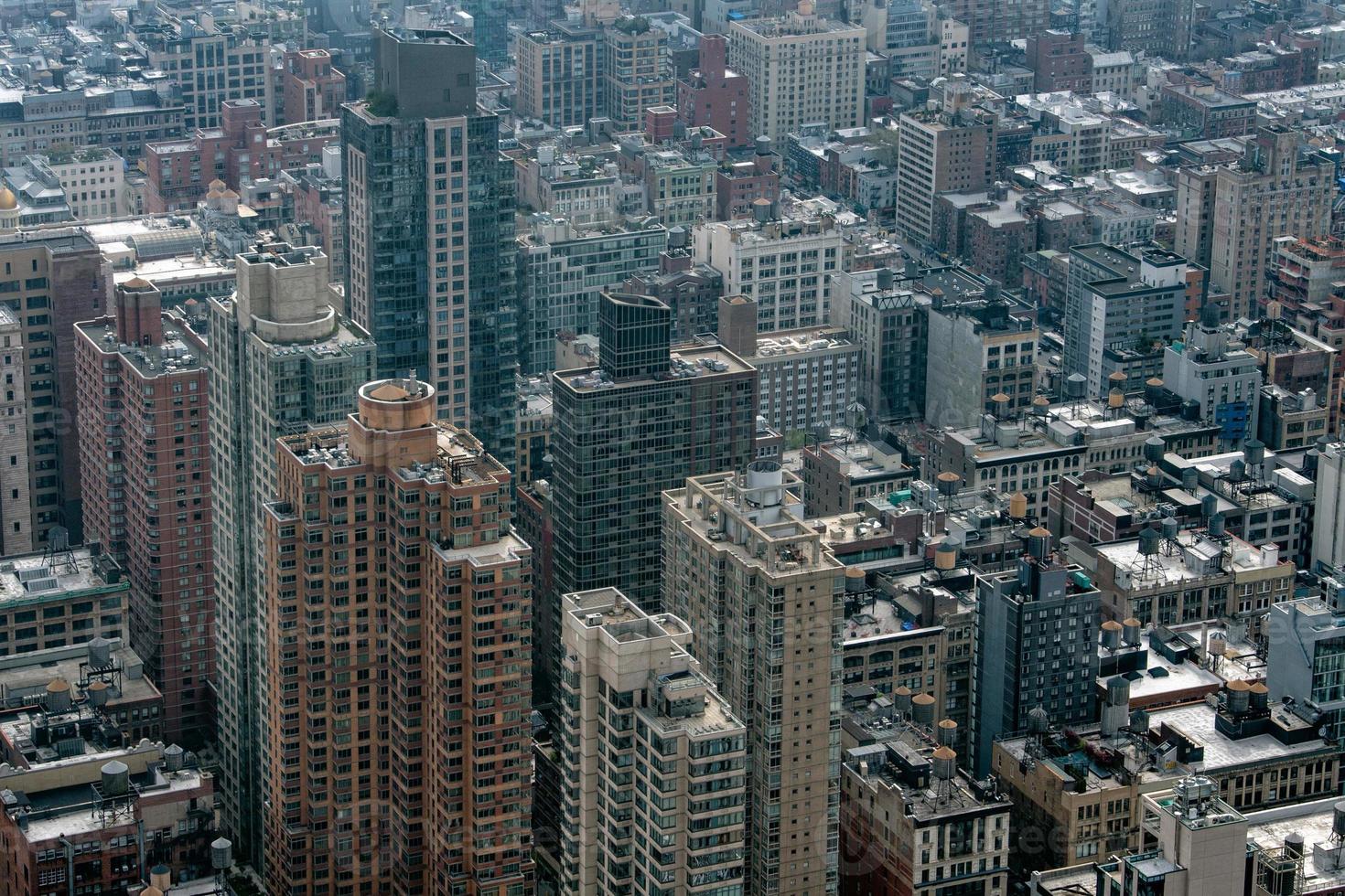 new york manhattan skyscrapers roofs and water tower photo