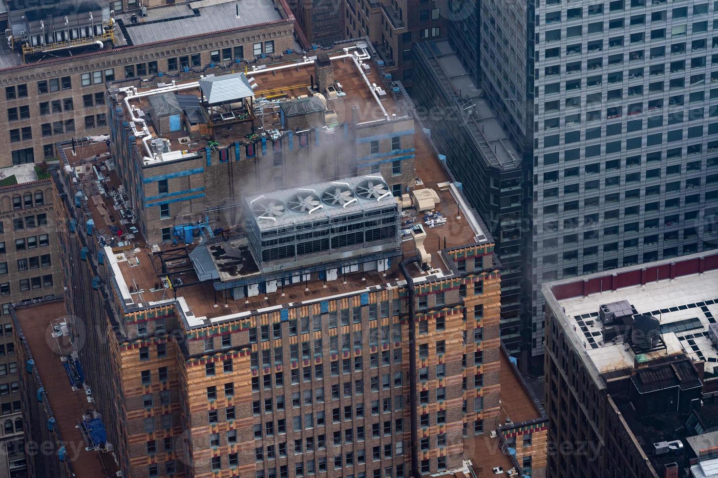 new york manhattan skyscrapers roofs and water tower photo