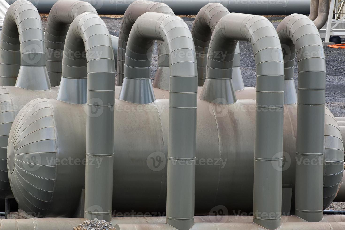 A pipeline in the heating geo thermal farm in Iceland photo