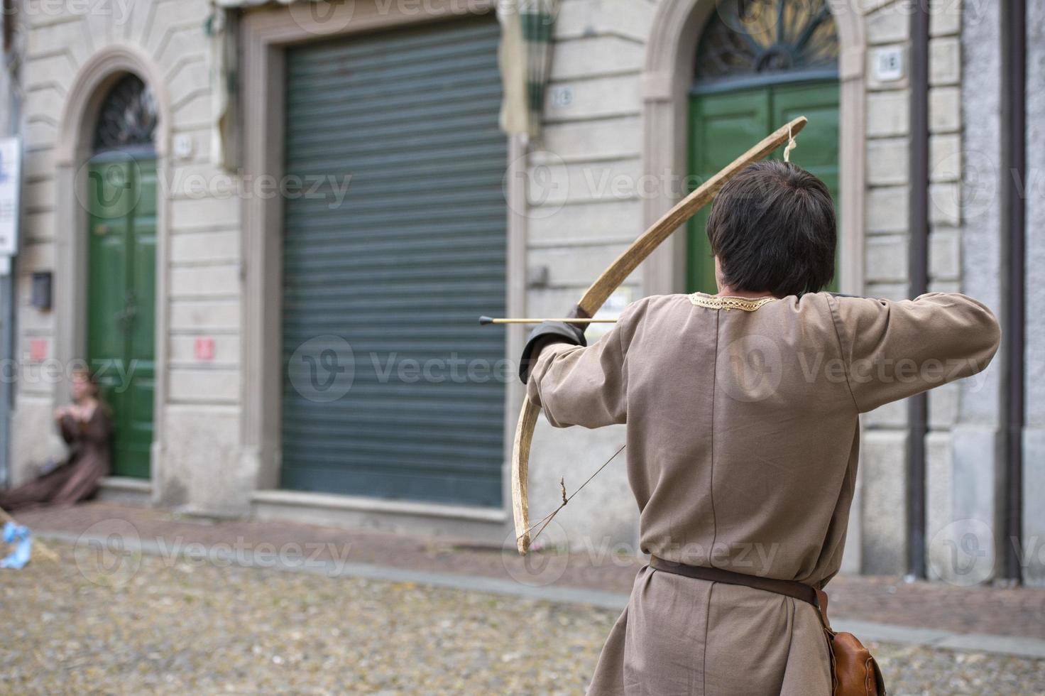 medieval archer shooting photo