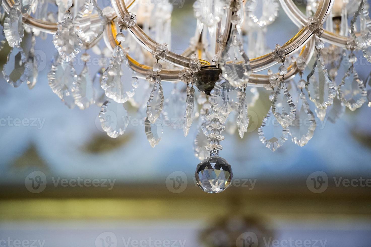 glass pendant detail of hall chandelier photo