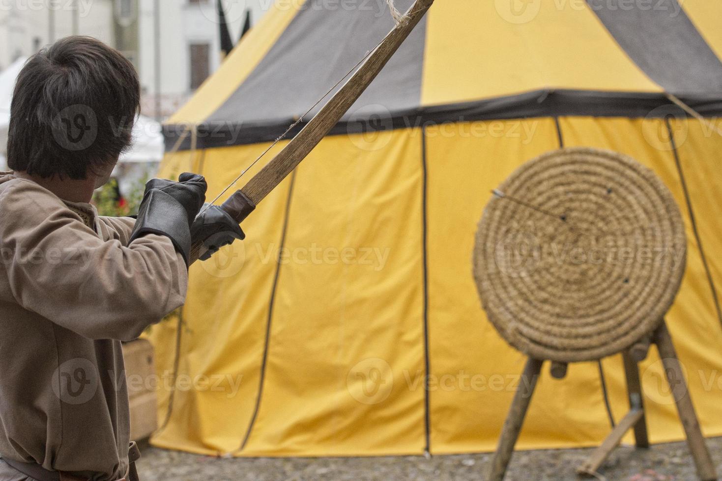 medieval archer shooting photo