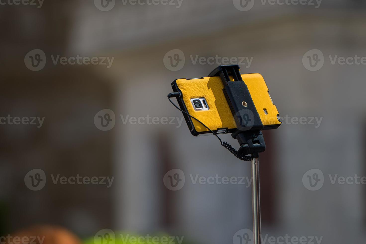 selfie remote control on cellular phone photo
