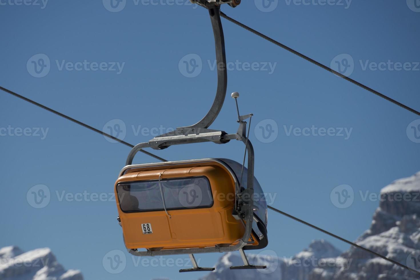 Chair Lift for skiers in winter snow time photo