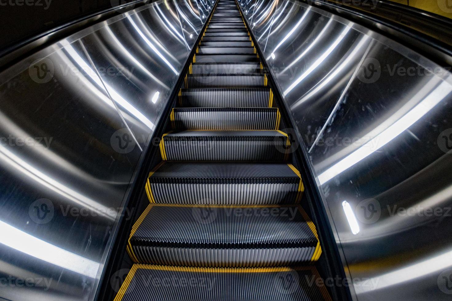 Underground Metro subway moving escalator photo