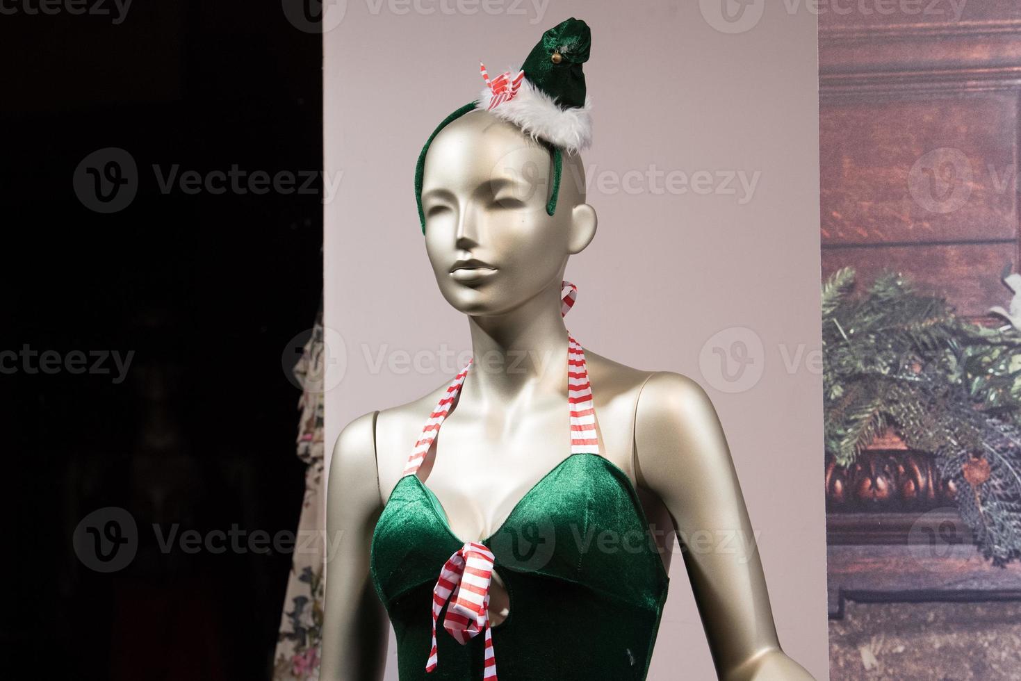 green elf dressed mannequin sexy female photo