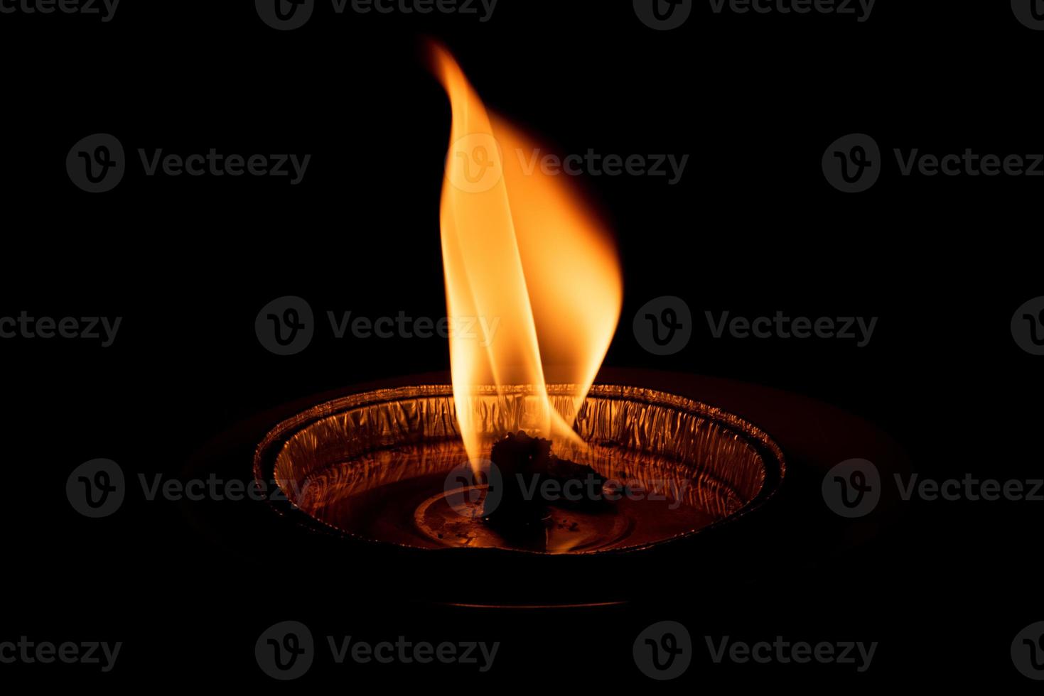red flame on black background photo