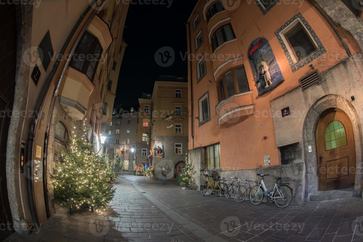 INNSBRUCK, AUSTRIA - DECEMBER 29,2015 - City street with christmas light photo