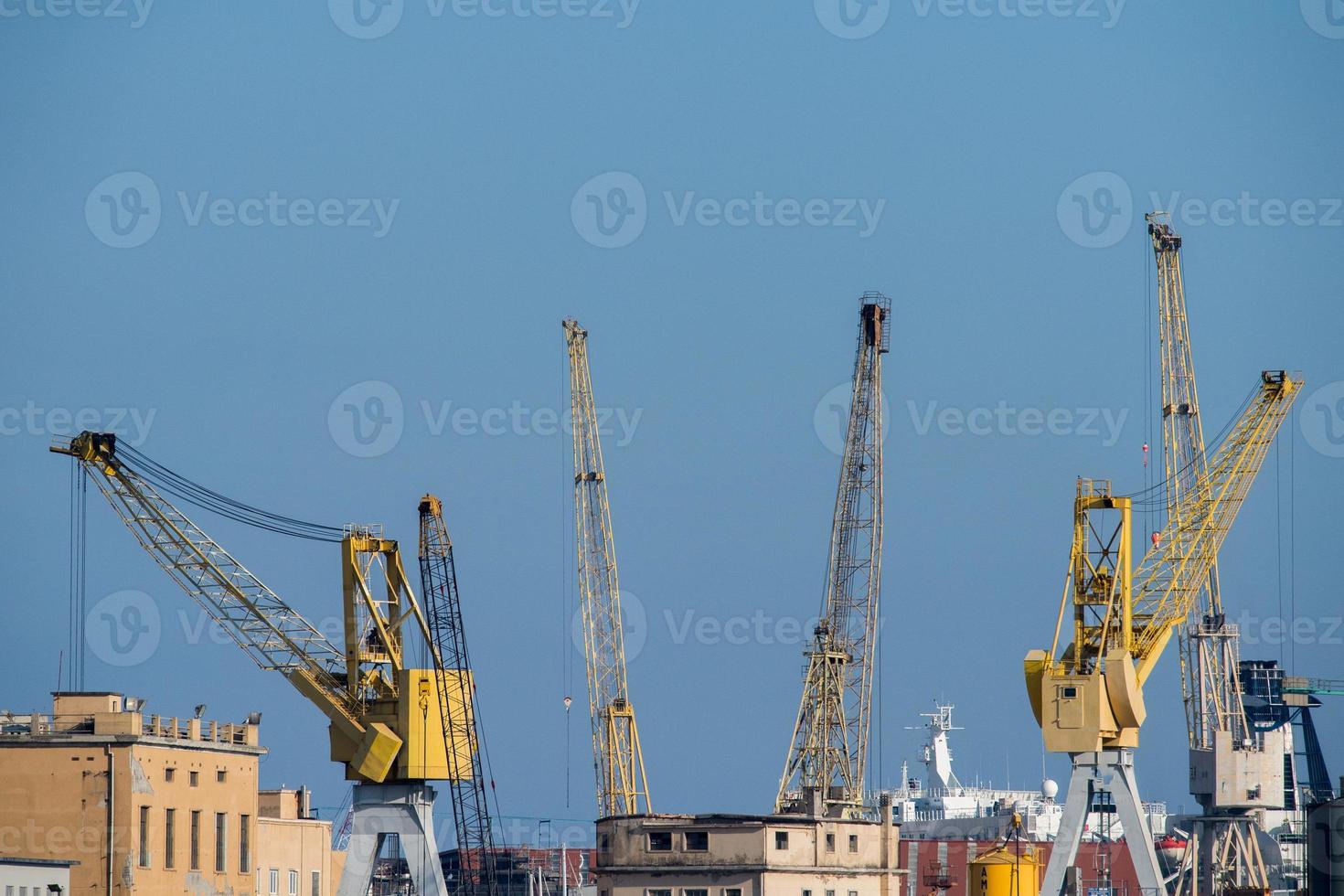 genoa town cityscape panorama from the sea harbor photo