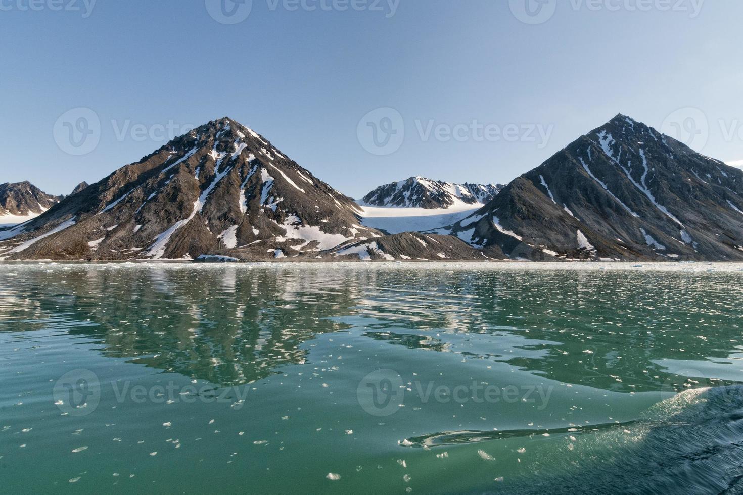 Svalbard Spitzbergen Glacier view with small iceberg photo