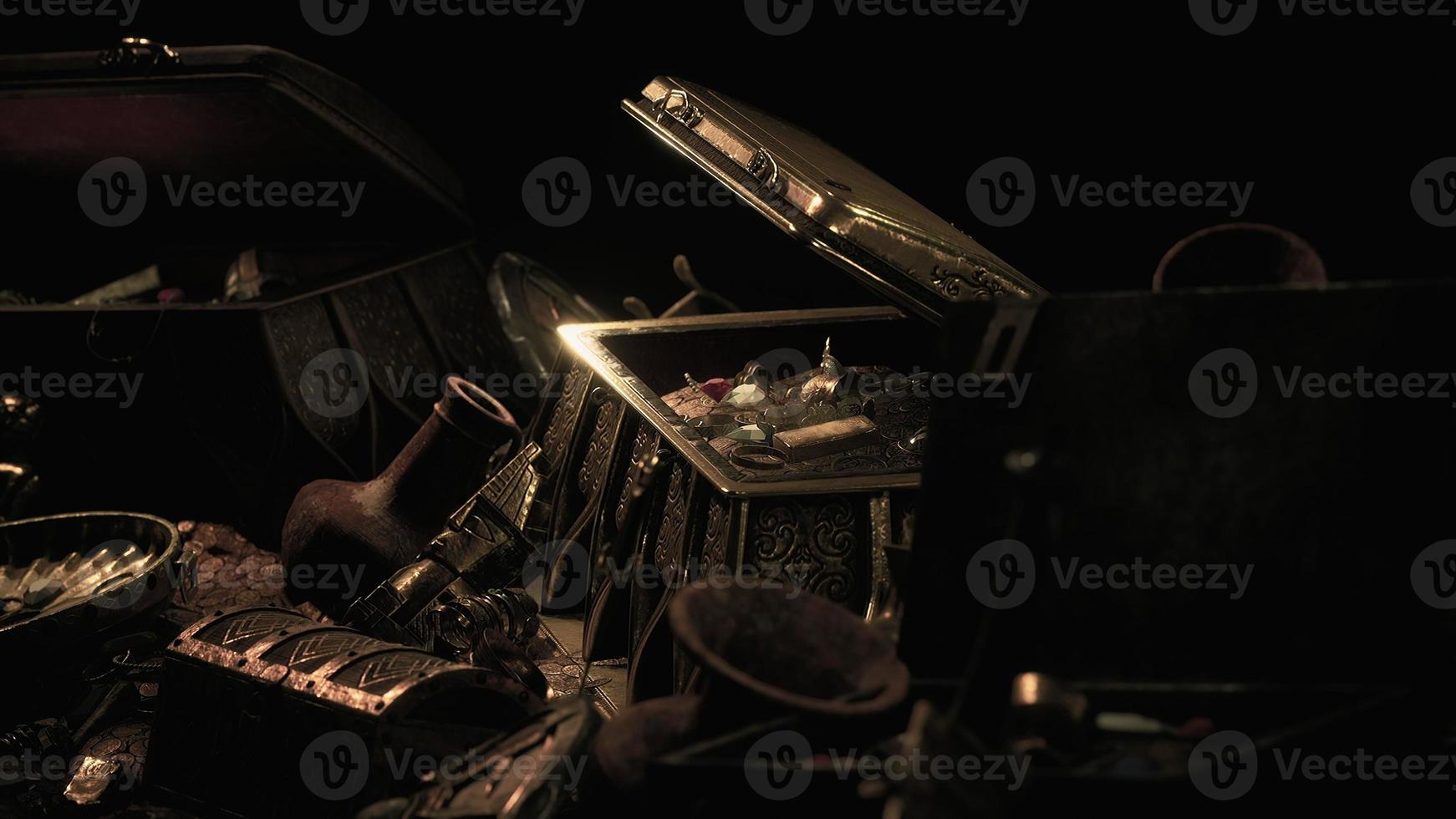 handful of gold jewelry on a dark background photo