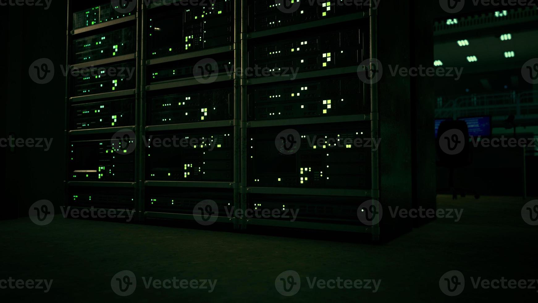 data center with multiple rows of fully operational server racks photo