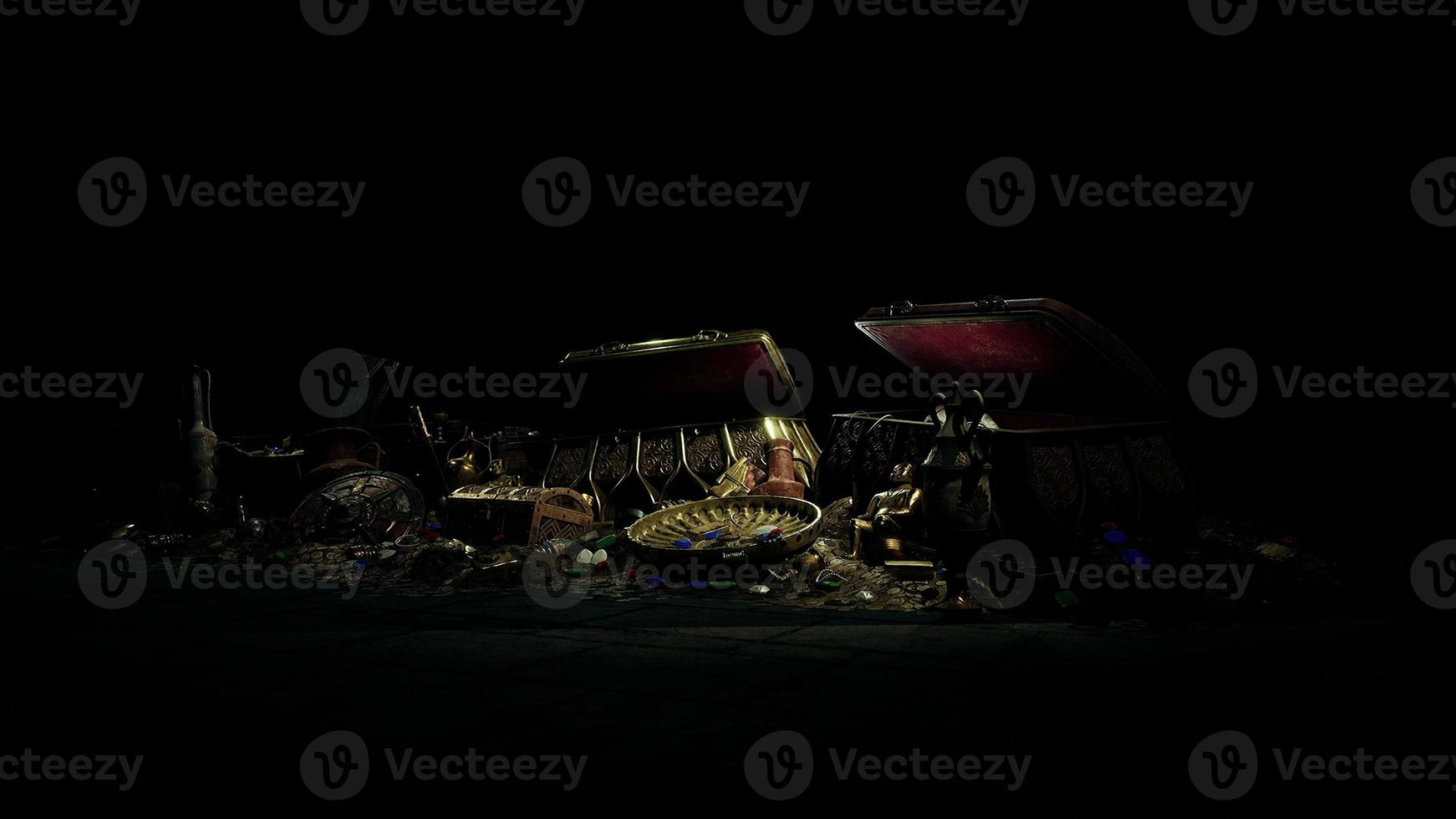 Open treasure chest with gold coins photo