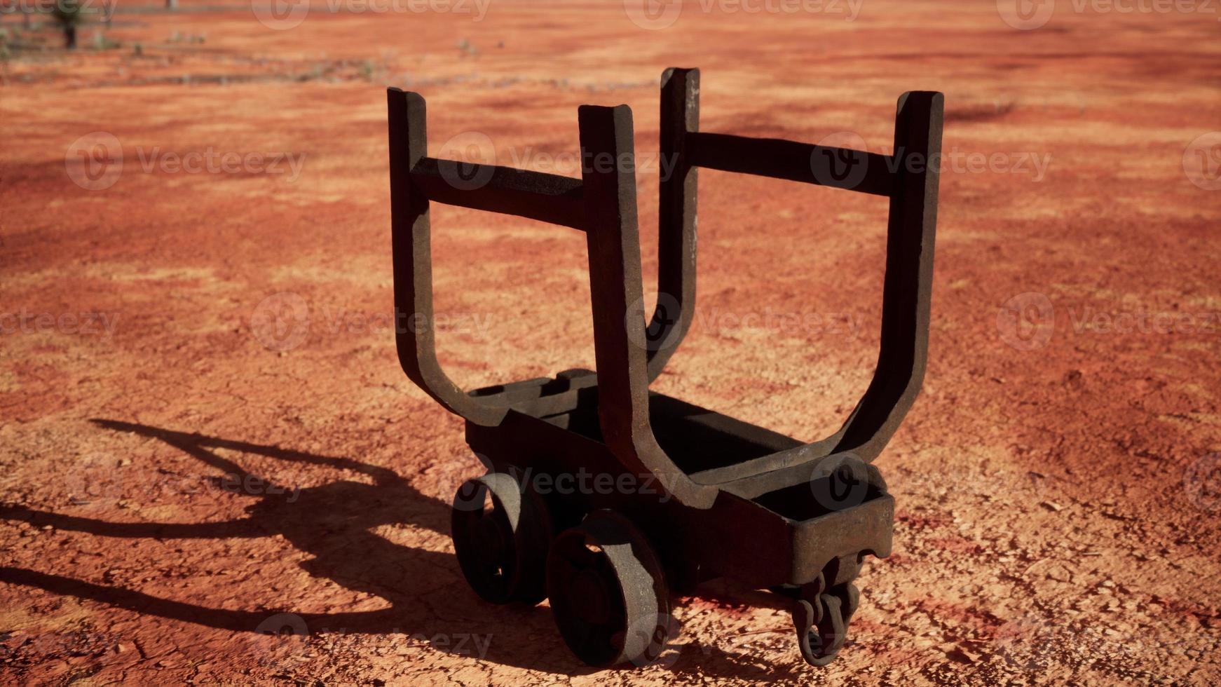old rusted Mining cart in desert photo