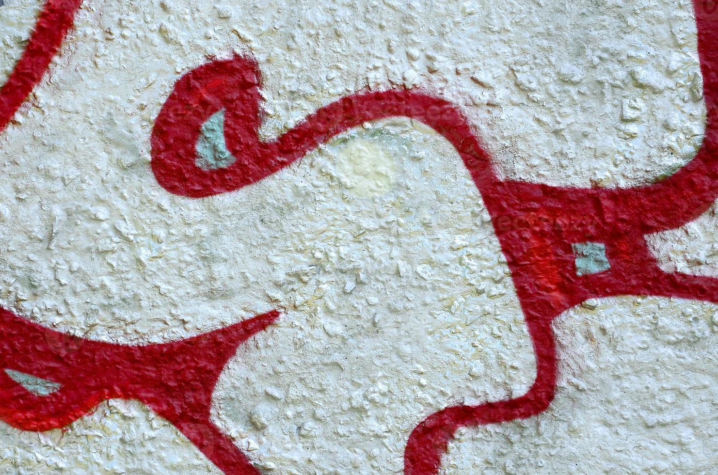 Street art. Abstract background image of a fragment of a colored graffiti painting in chrome and red tones photo