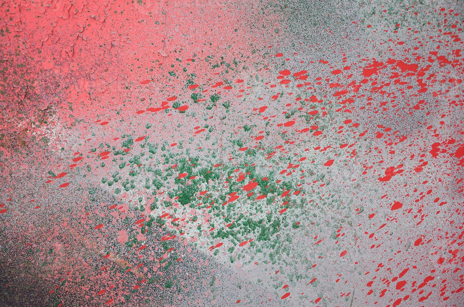 A large fragment of the graffiti pattern applied to the wall with aerosol paint. The gradient between several colors is carried out by spraying the paint. Abstract background image photo