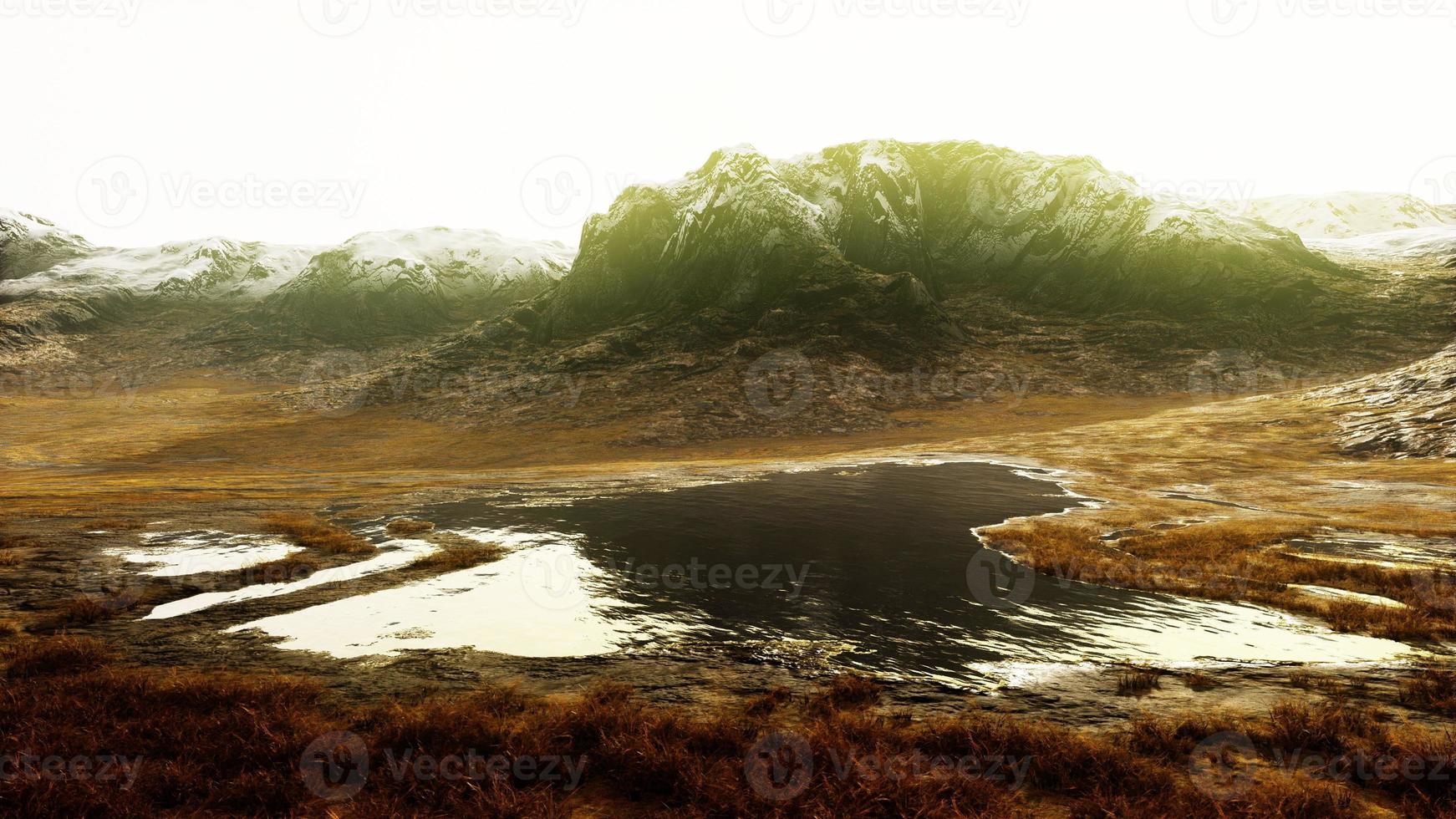 Panoramic view on mountains covered with snow photo