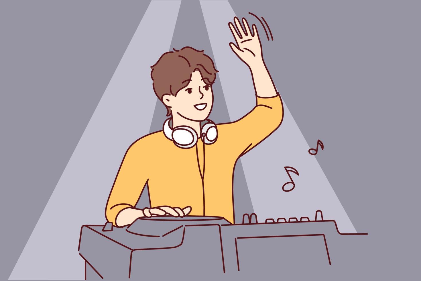 Male DJ waving to greet club goers and cheer up dancing people. Guy with headphones around neck stands behind mixing console while controlling music at party. Flat vector illustration