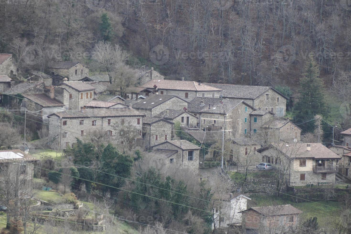 Old frassinedolo medieval village walls in valley around Bismantova stone near castelnovo ne monti photo