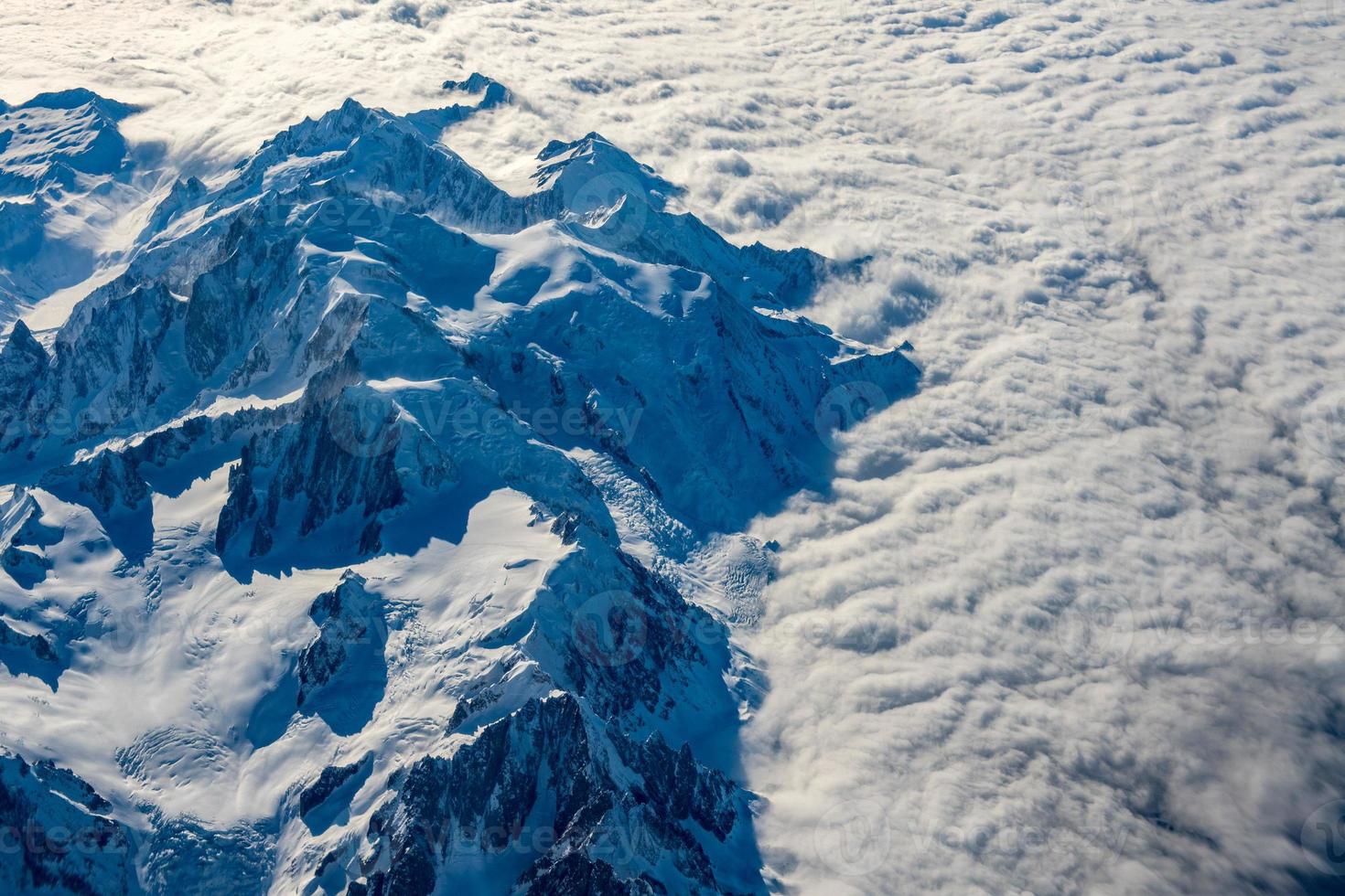 Alps aerial view from airplane photo