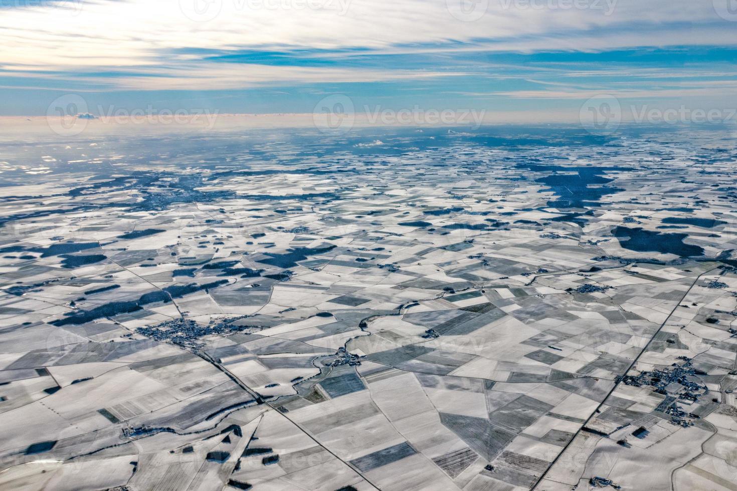 europe france winter farmed fields covered by snow aerial panorama photo