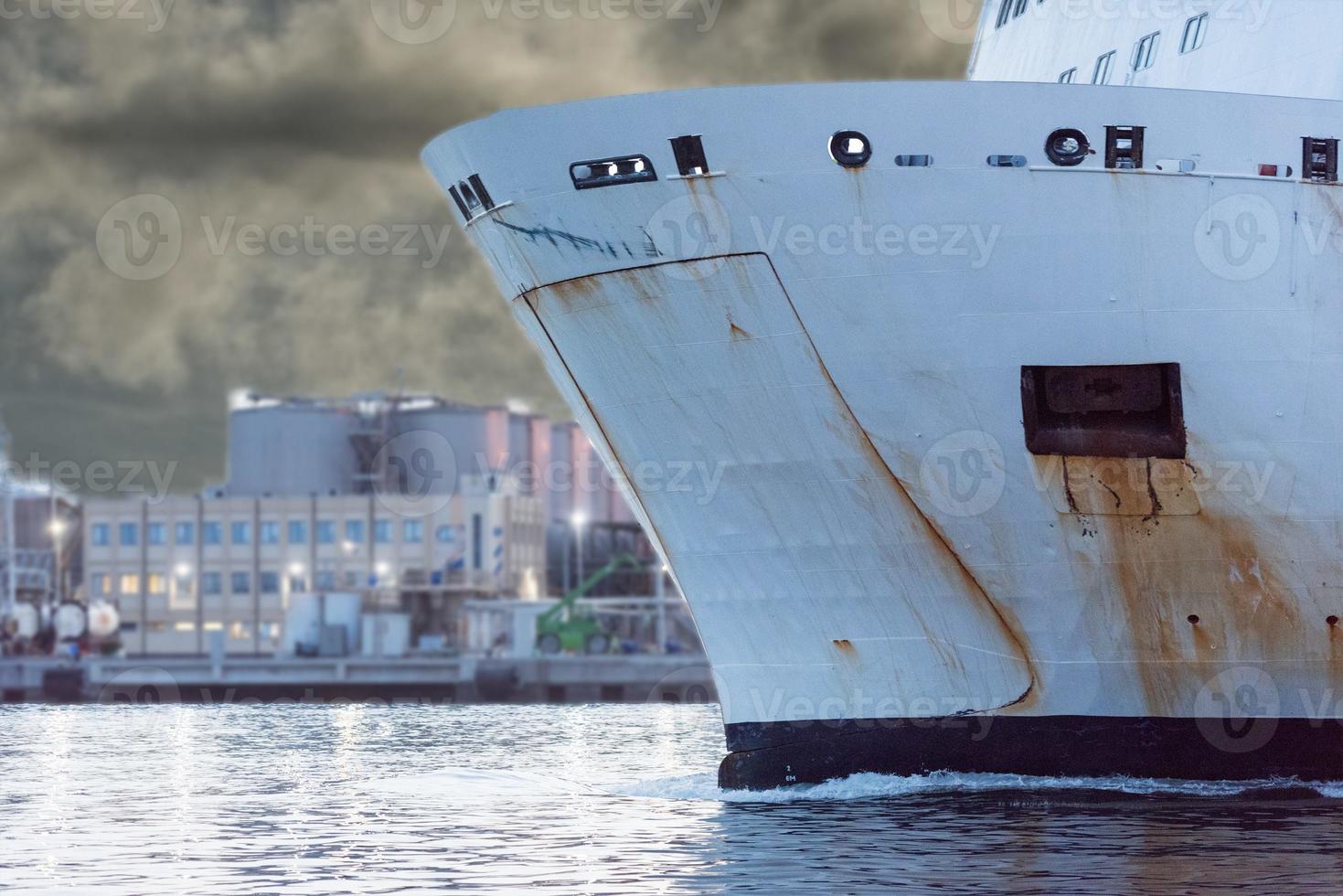 ship prow at night harbor operation photo